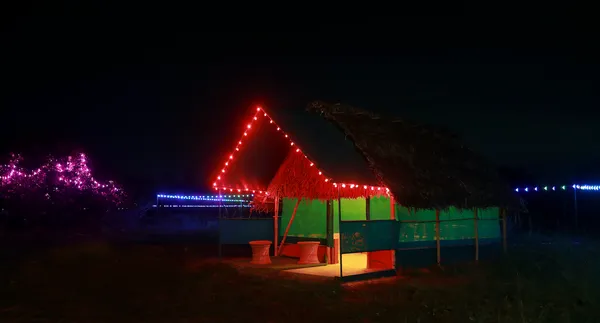 Hut lit up at night